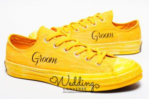 Bright yellow groom trainers and groom appears on the side