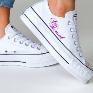 White platform trainer with bright pink just married on the side